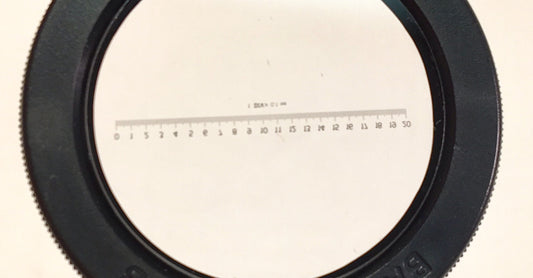 Metric Reticle for Sieve Verification Lenscope